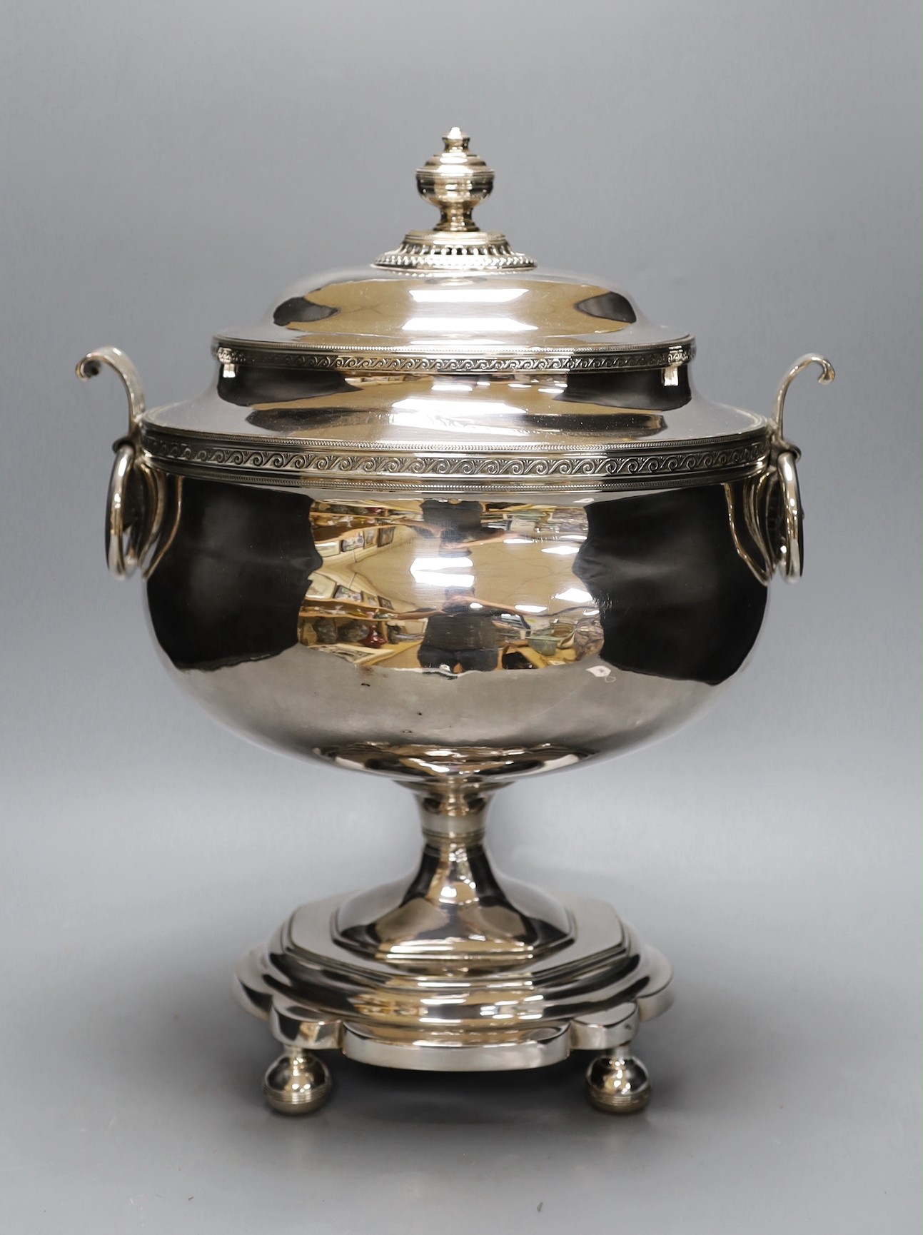 A 19th century silver plated tea urn, Egyptianesque handles, 43cm